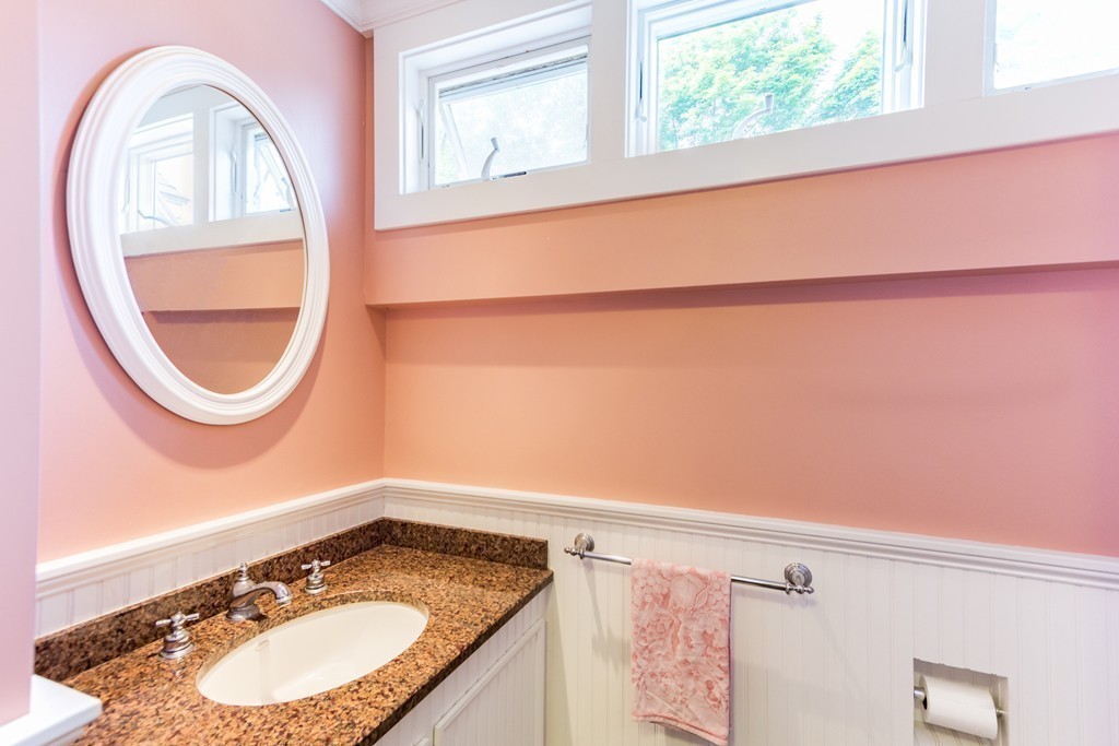 4 Echo Avenue Gloucester, MA 01930 - Photo 23 of 26 a bathroom with a sink and a mirror