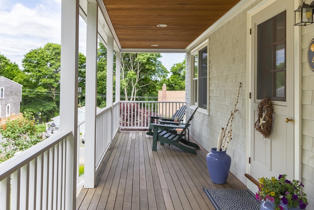 4 Echo Avenue Gloucester, MA 01930 - Photo 24 of 26 a view of balcony with chairs and wooden fence