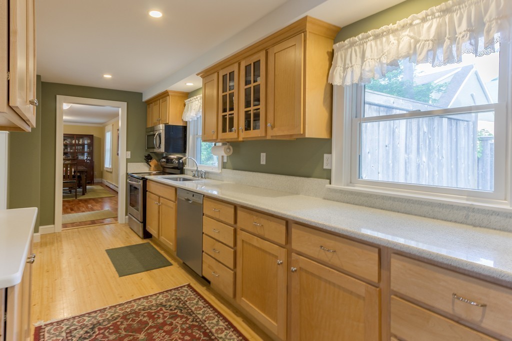 4 Echo Avenue Gloucester, MA 01930 - Photo 8 of 26 a large bathroom with a sink and a large mirror