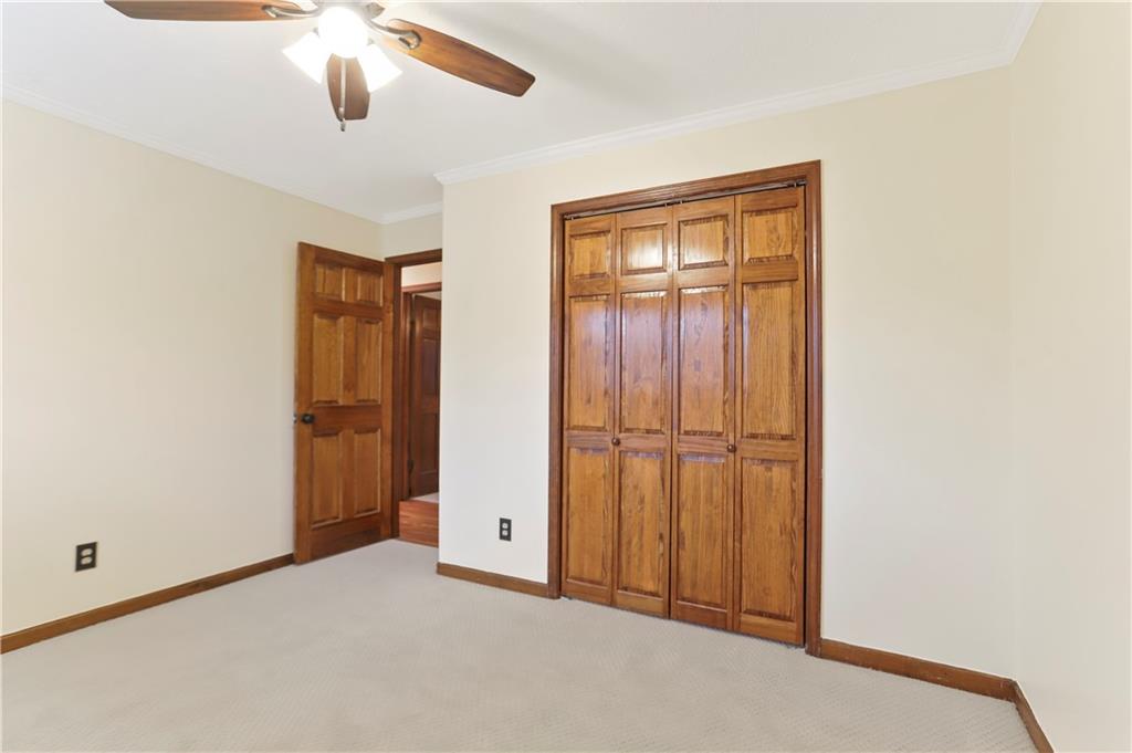 1132 Lafayette Drive Southwest Mableton, GA 30126 - Photo 20 of 35 an empty room with chandelier fan