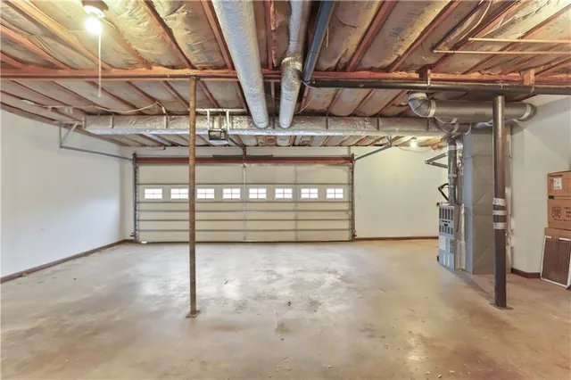 a view of a room with wooden walls