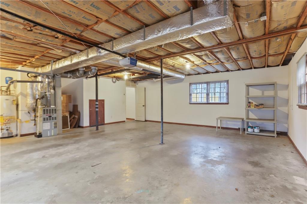 1132 Lafayette Drive Southwest Mableton, GA 30126 - Photo 28 of 35 a view of a room with wooden walls