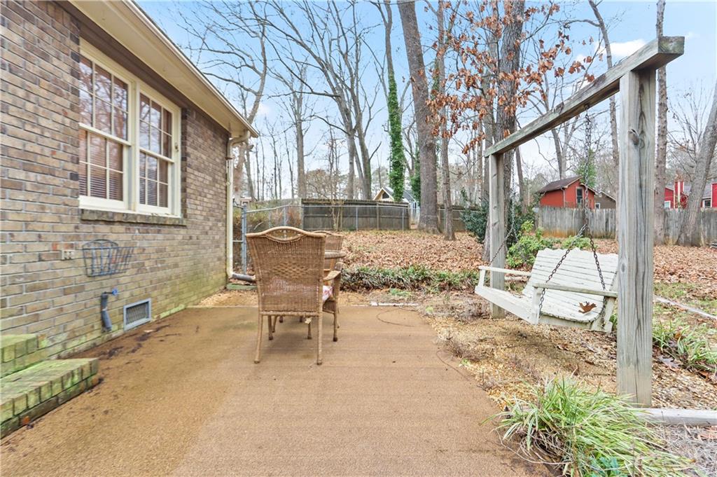 1132 Lafayette Drive Southwest Mableton, GA 30126 - Photo 30 of 35 a view of a backyard with a sitting area