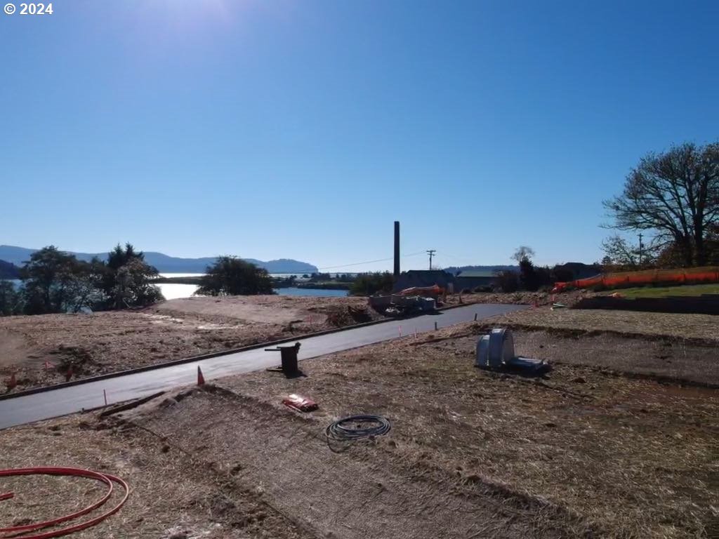 501 Garibaldi Avenue, Unit 6 Garibaldi, OR 97118 - Photo 18 of 24 a view of a backyard with a table and chairs