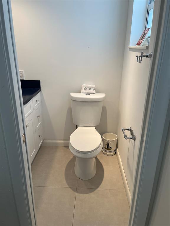 1481 South Ocean Boulevard, Unit 415A Pompano Beach, FL 33062 - Photo 24 of 39 a white toilet sitting next to a white sink