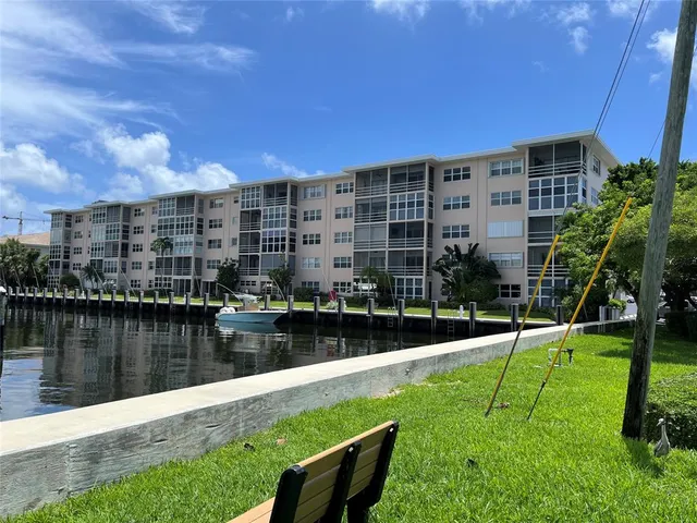 a view of a lake with a building next to a lake
