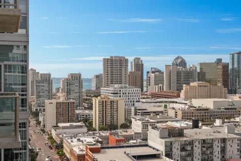 a view of city with tall buildings