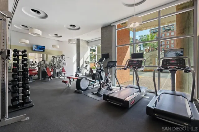 a view of swimming pool with outdoor seating and yard