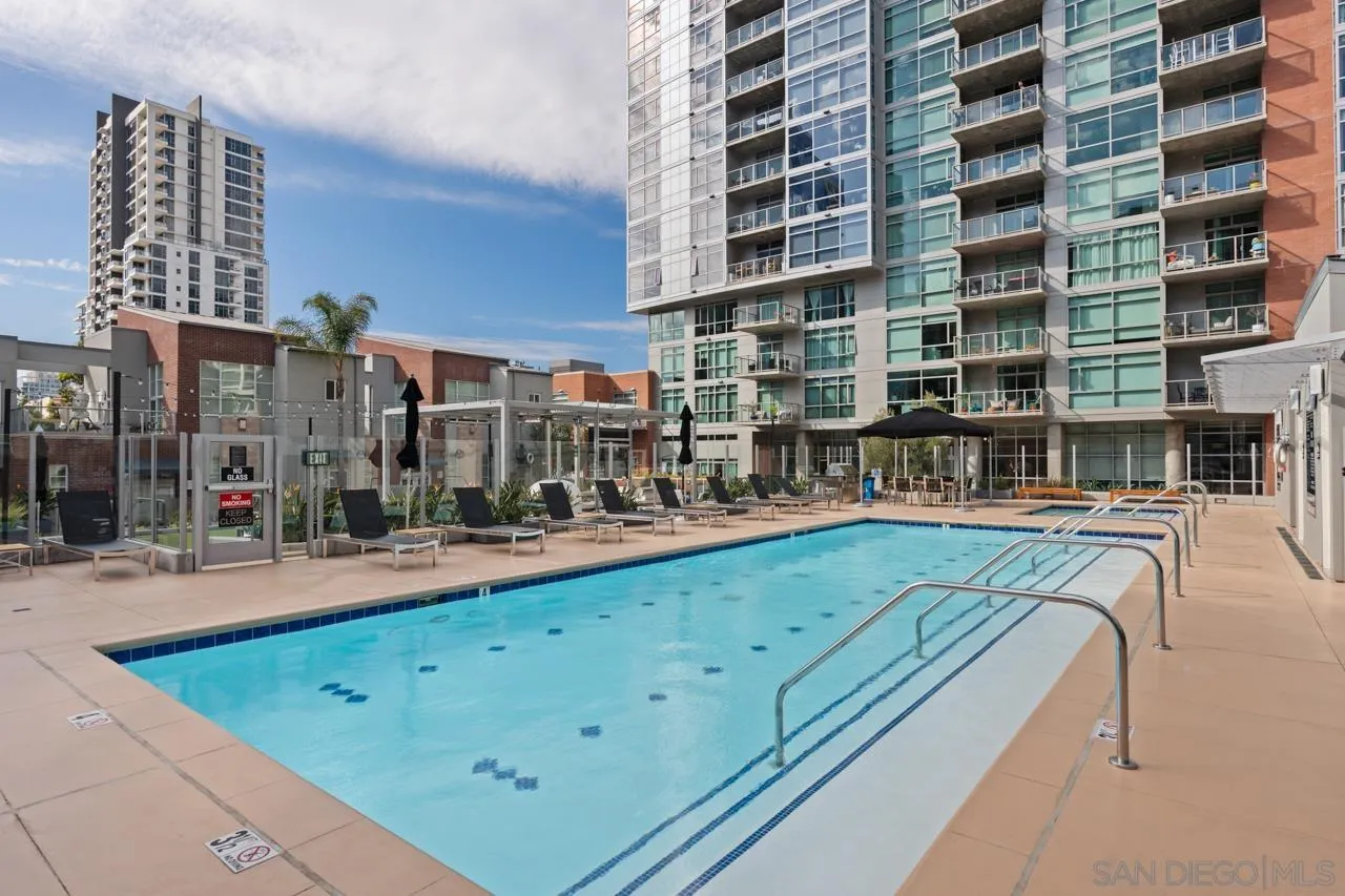 800 The Mark Lane, Unit 2103 San Diego, CA 92101 - Photo 20 of 25 a view of a swimming pool with outdoor seating