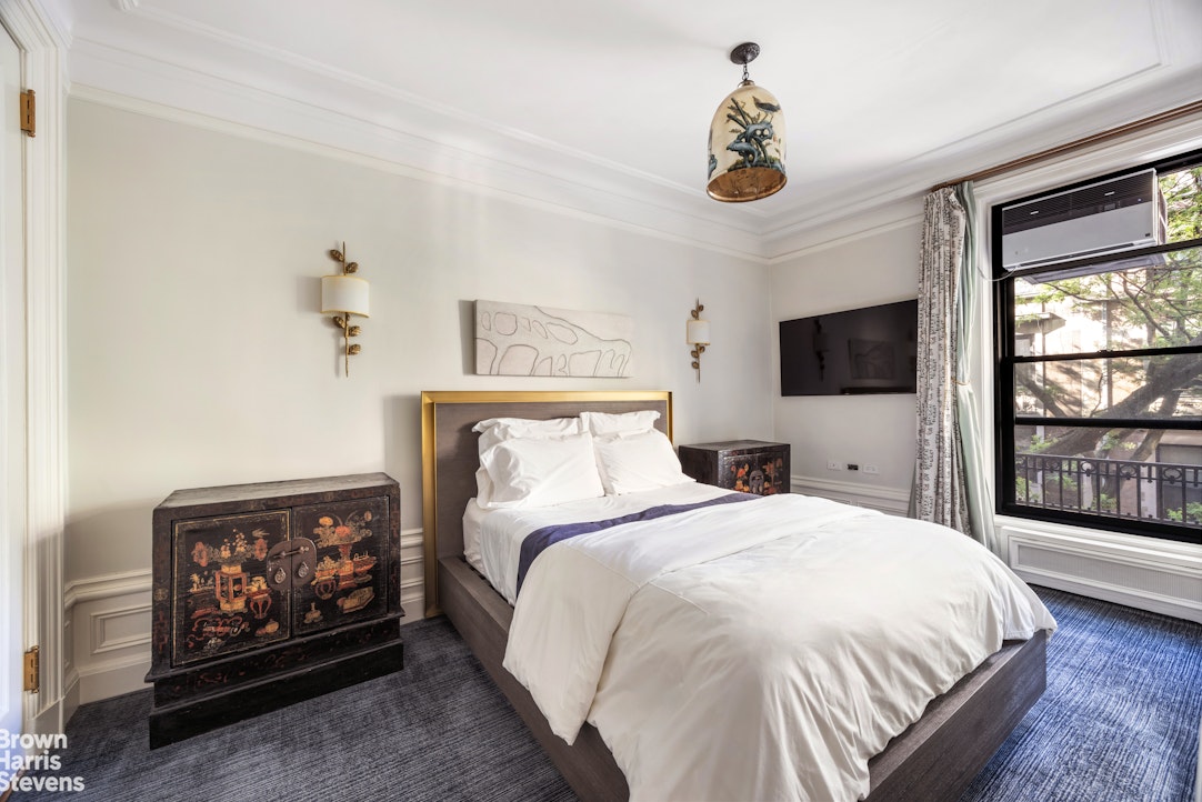 645 West End Avenue, Unit 2A Manhattan, NY 10025 - Photo 8 of 13 a bedroom with a bed and a flat screen tv