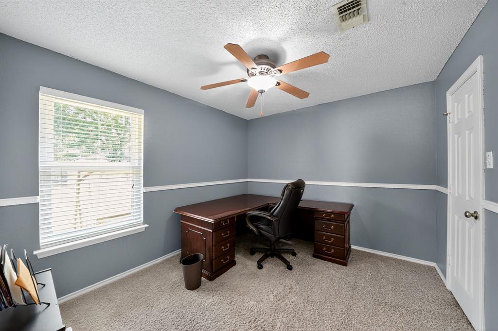 604 McAnear Street Cleburne, TX 76033 - Photo 15 of 18 a view of workspace with a window