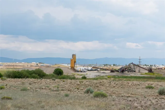 a view of a lake and covered with fog