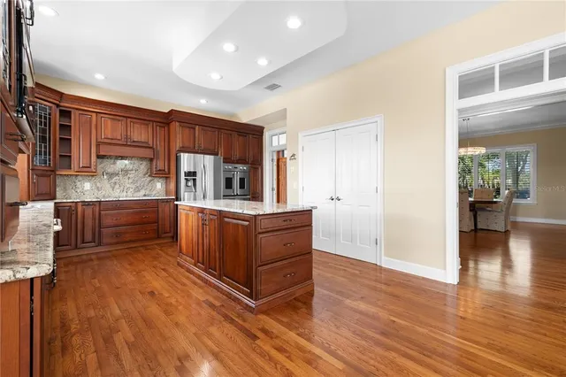 a living room with fireplace furniture and a flat screen tv