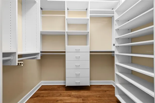 a view of a house with porch and furniture