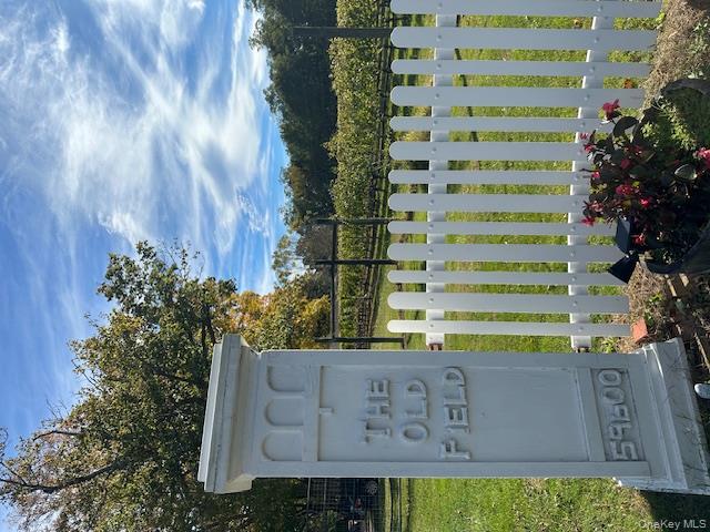 535 Bay Home Road Southold, NY 11971 - Photo 13 of 15 a view of a house with a flower garden