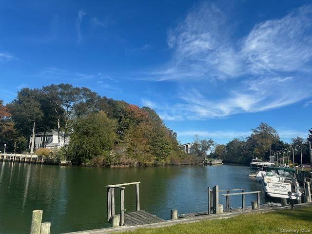 535 Bay Home Road Southold, NY 11971 - Photo 7 of 15 a view of a lake with houses in the back