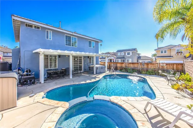 a view of a house with swimming pool