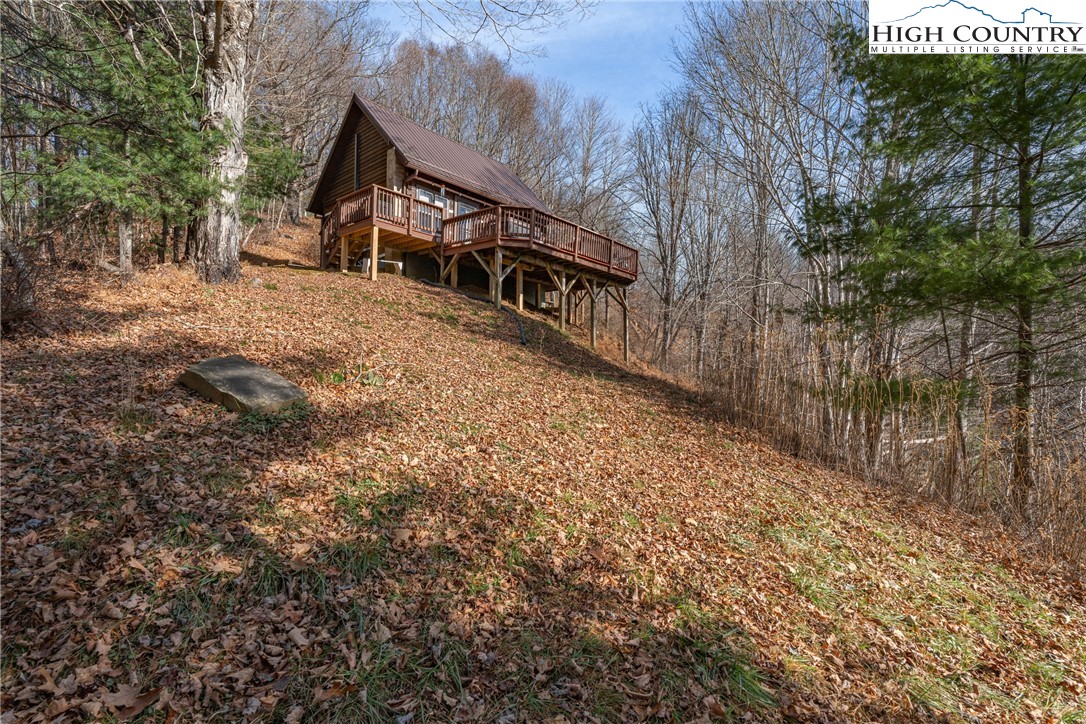 419 Billy Billings Road Vilas, NC 28692 - Photo 3 of 50 a view of a house with a yard