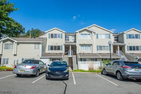 a car parked in front of a house