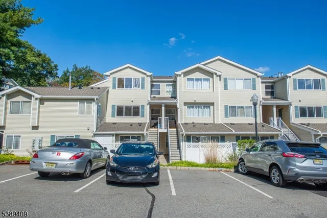 a car parked in front of a house