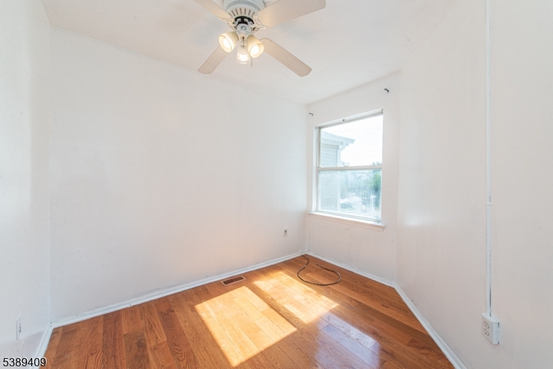 17 Livingston Road Morristown, NJ 07960 - Photo 14 of 19 an empty room with a window