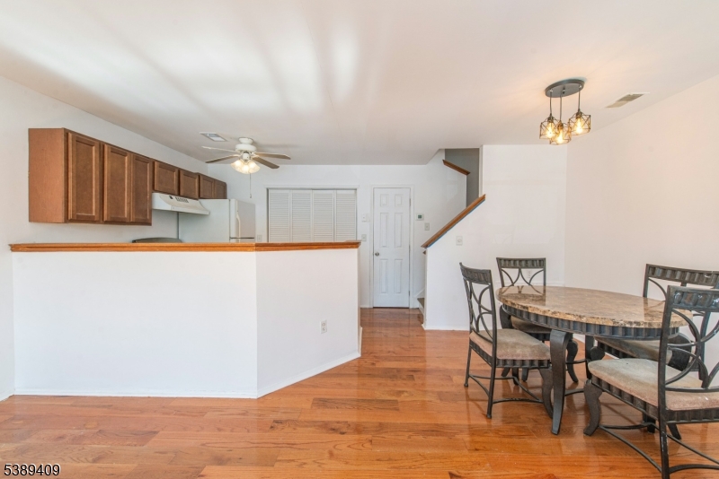 17 Livingston Road Morristown, NJ 07960 - Photo 5 of 19 a dinning room dining table chairs and a refrigerator