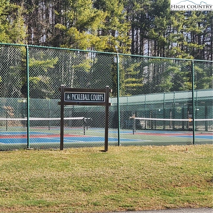 58 River Road Newland, NC 28657 - Photo 27 of 28 a view of a swimming pool with outdoor seating