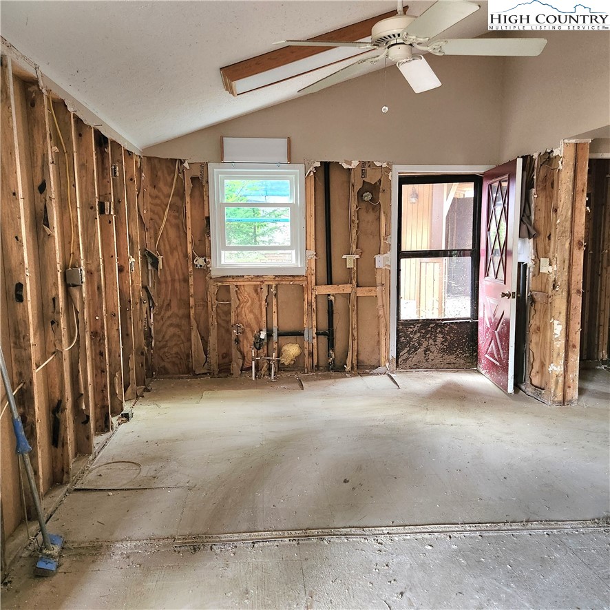 58 River Road Newland, NC 28657 - Photo 5 of 28 a view of livingroom with hardwood floor and a ceiling fan