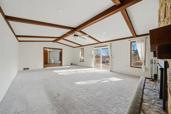 a view of a livingroom with a flat screen tv