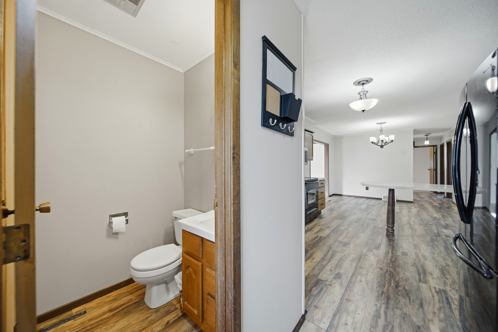 13831 Prairie Center Road Morrison, IL 61270 - Photo 15 of 32 a bathroom with a toilet sink and a mirror
