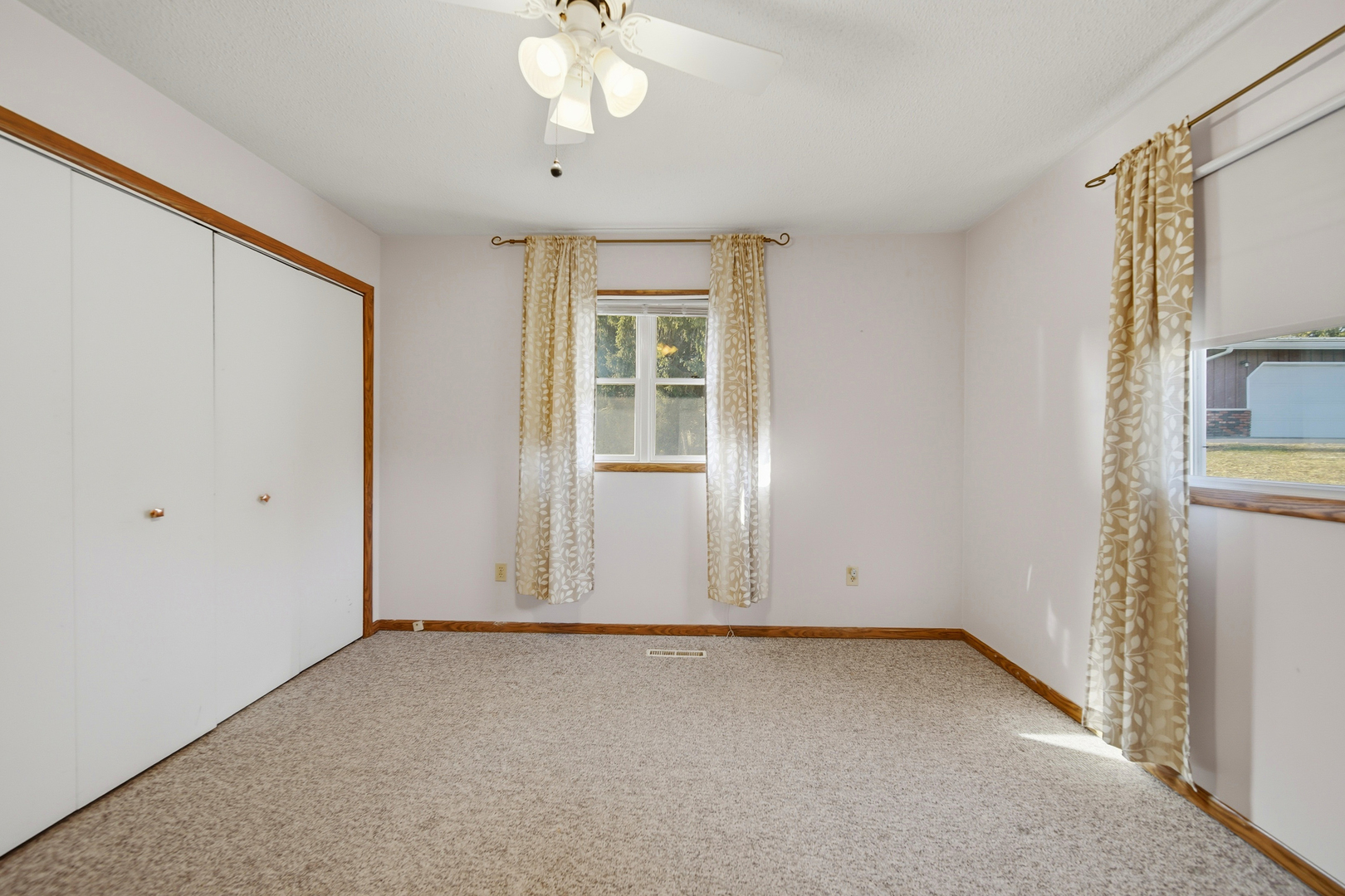 13831 Prairie Center Road Morrison, IL 61270 - Photo 19 of 32 an empty room with windows