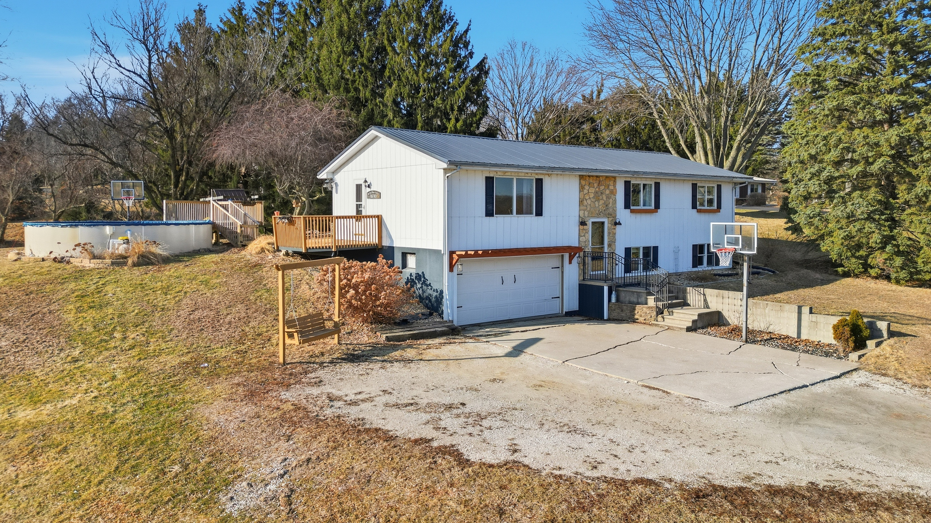 13831 Prairie Center Road Morrison, IL 61270 - Photo 2 of 32 a view of a house with backyard and sitting area