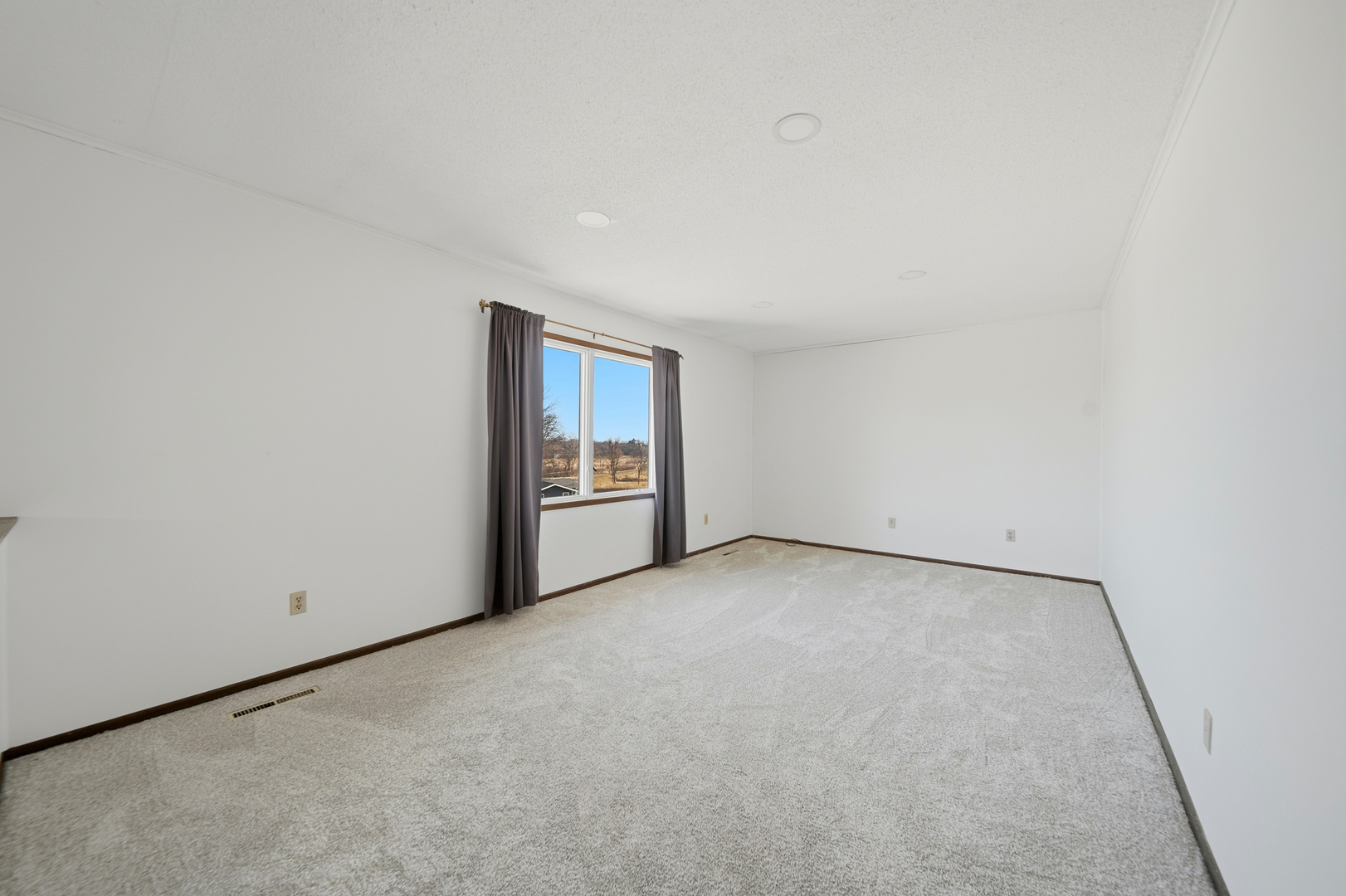 13831 Prairie Center Road Morrison, IL 61270 - Photo 8 of 32 a view of an empty room and stove