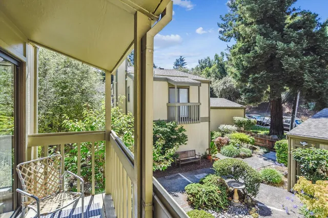 a view of a porch with a furniture