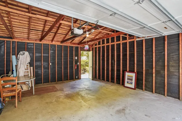 a view of a room with wooden walls