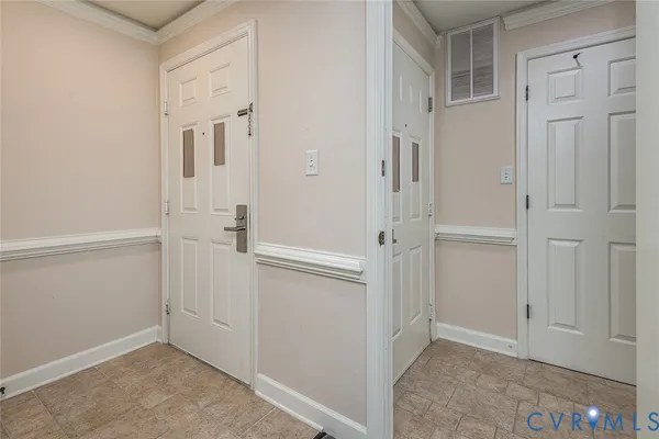 a kitchen with stainless steel appliances granite countertop a refrigerator a stove and a sink