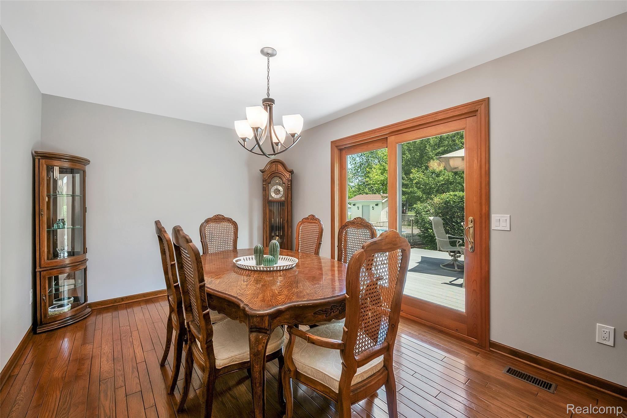 4054 Bennett Lake Road Fenton, MI 48430 - Photo 14 of 57 Doorwall off Dining Room to Private 16x20 Deck & Pool