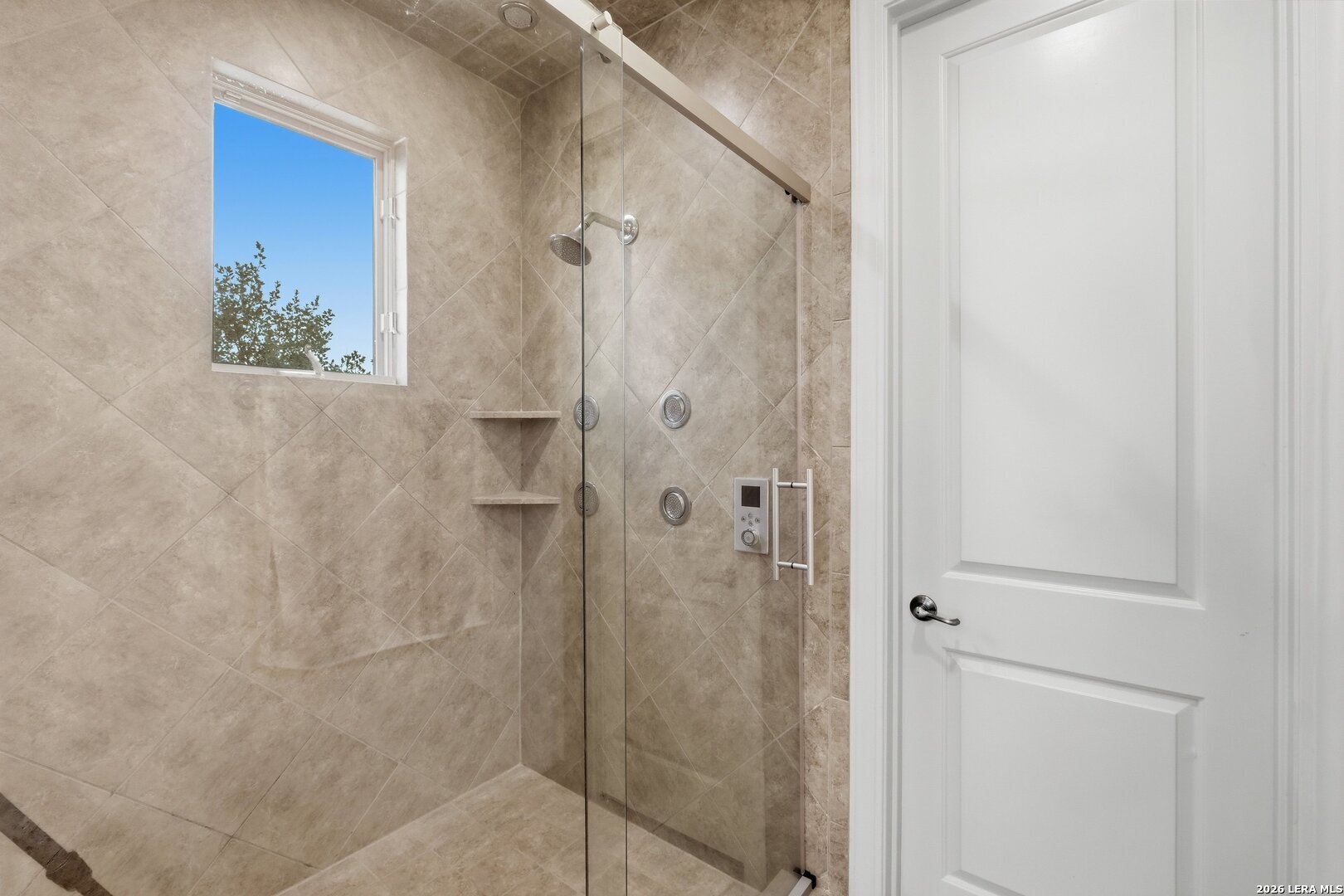 426 Legacy Ridge San Antonio, TX 78258 - Photo 18 of 38 a bathroom with a shower