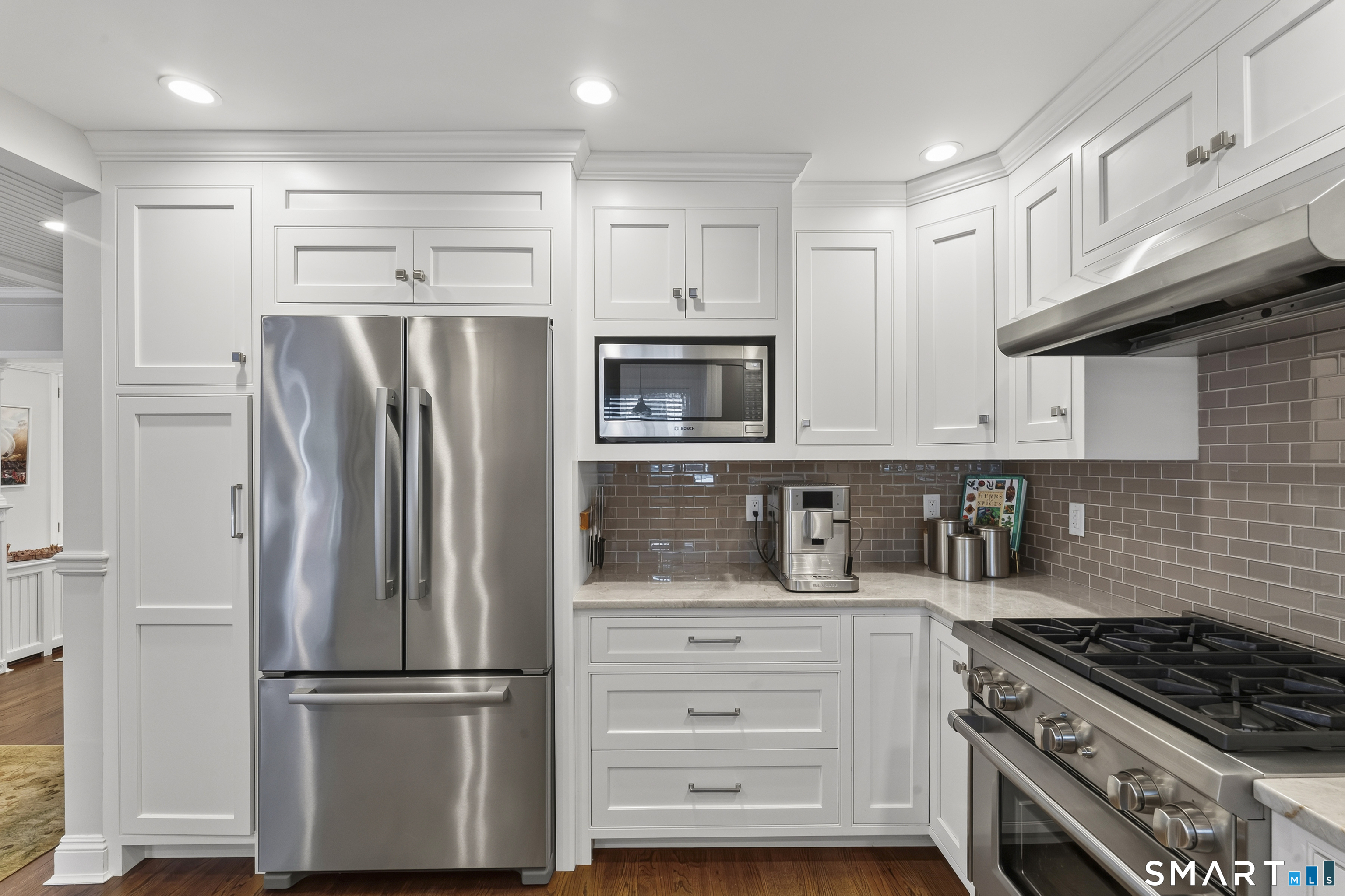 679 Fairfield Beach Road, Unit 679 Fairfield, CT 06824 - Photo 15 of 38 Bosch and Wolf appliances.