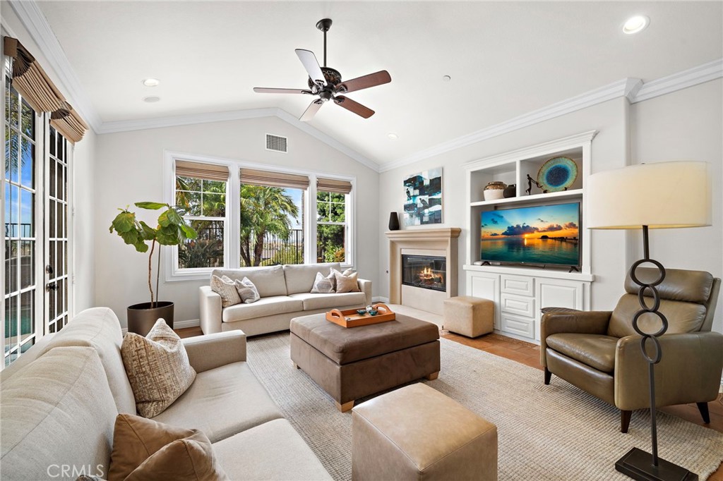 8 Ranunculus Street Ladera Ranch, CA 92694 - Photo 17 of 39 a living room with furniture and a large window