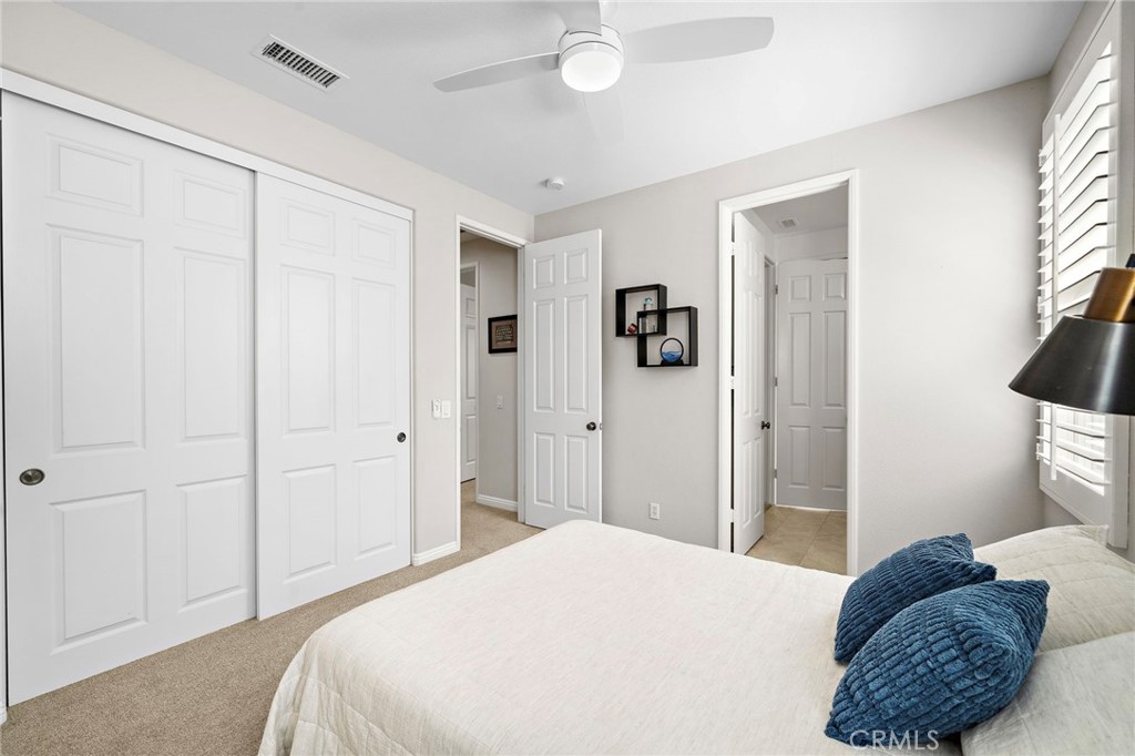 8 Ranunculus Street Ladera Ranch, CA 92694 - Photo 22 of 39 a bedroom with a bed and a cabinets