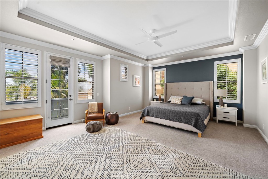 8 Ranunculus Street Ladera Ranch, CA 92694 - Photo 27 of 39 a bedroom with furniture and large windows