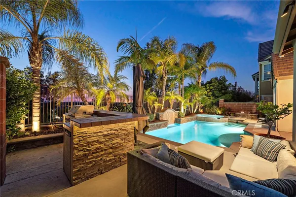 a view of a patio with swimming pool