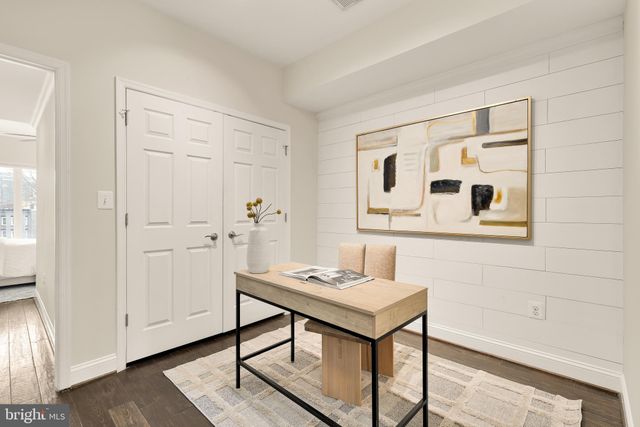 a view of a bathroom with sink and mirror
