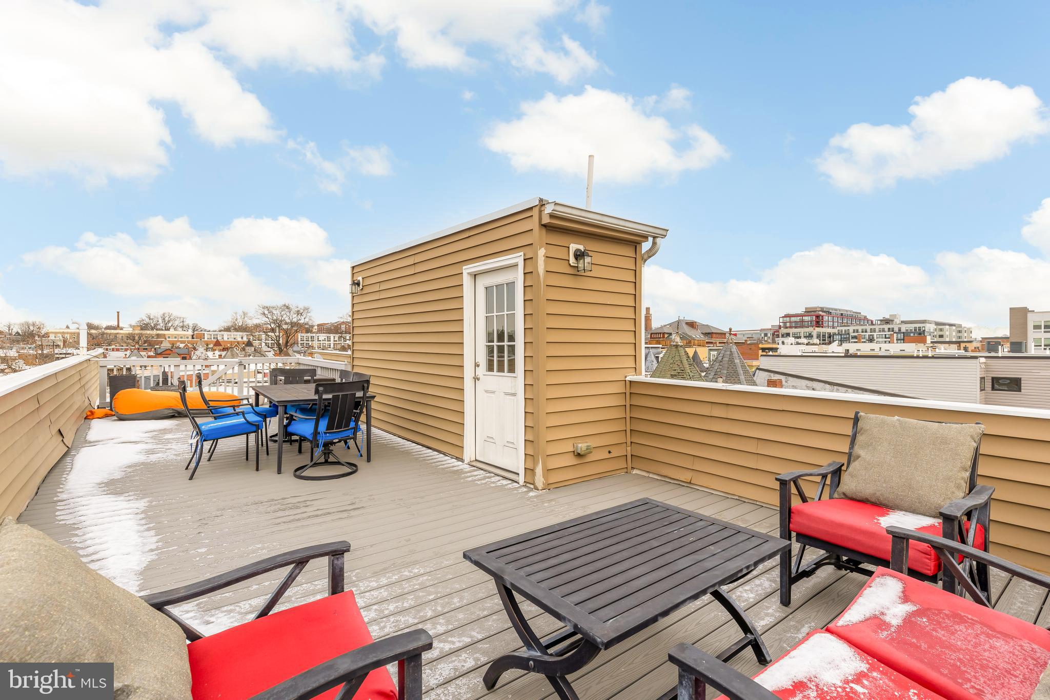 29 Q Street Northeast, Unit 2 Washington, DC 20002 - Photo 20 of 22 an outdoor sitting area with furniture and city view