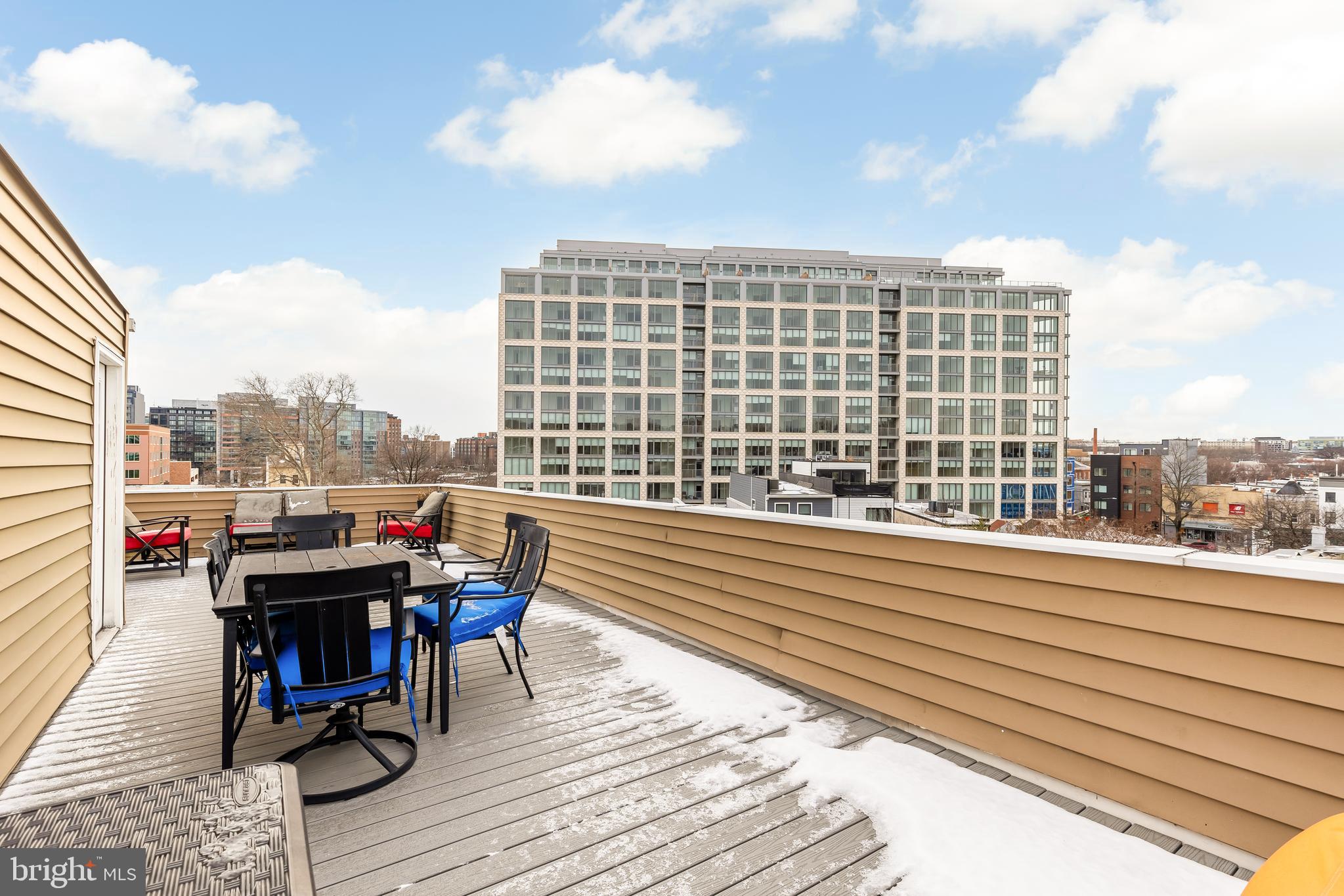 29 Q Street Northeast, Unit 2 Washington, DC 20002 - Photo 21 of 22 a view of balcony with deck and outdoor seating