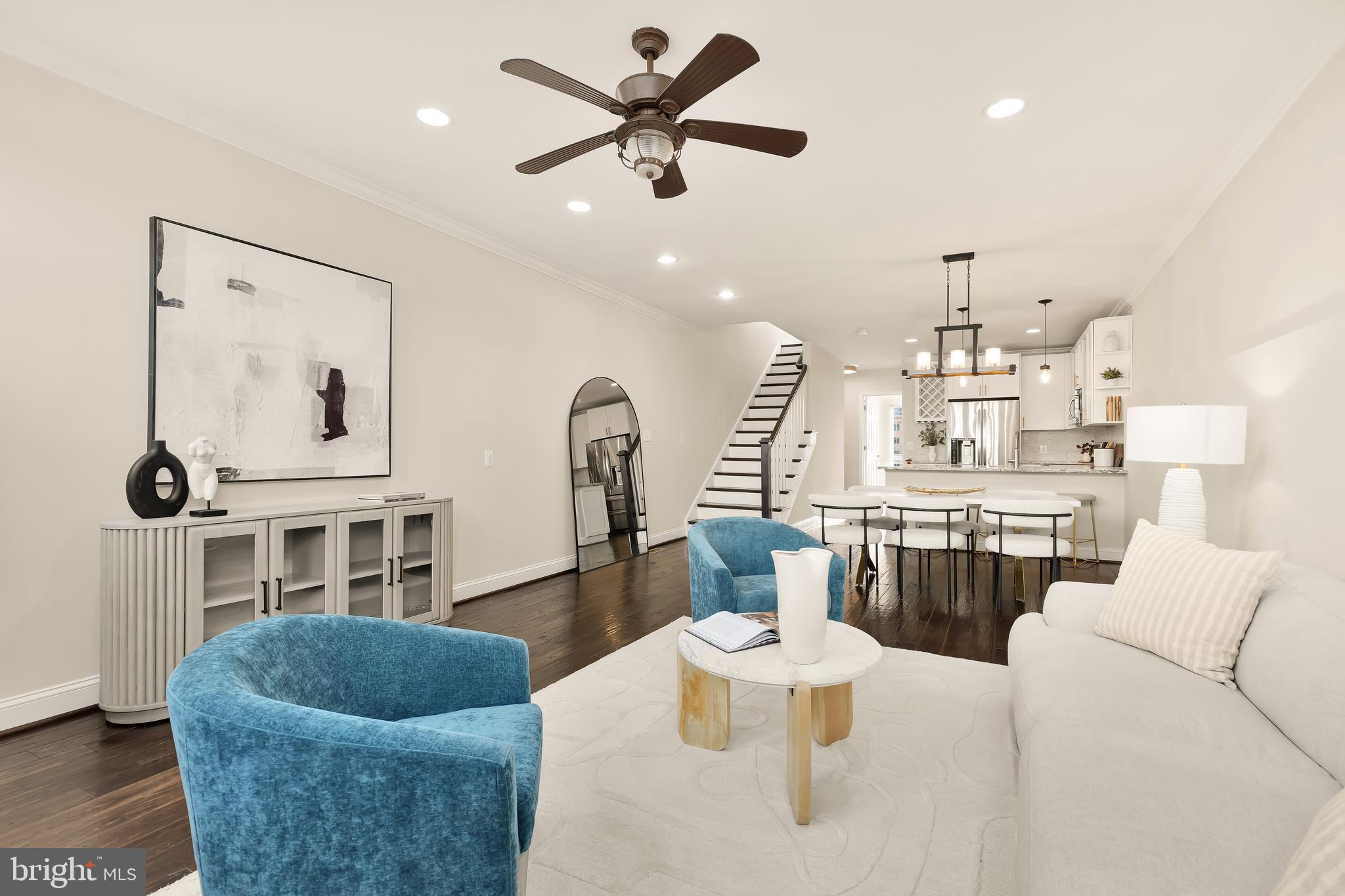 29 Q Street Northeast, Unit 2 Washington, DC 20002 - Photo 8 of 22 a living room with furniture and a large window
