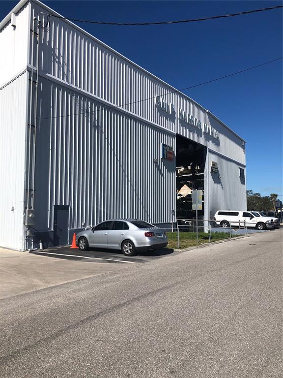 100 Circuit Road, Unit N77 Nokomis, FL 34275 - Photo 11 of 12 a view of a street with car parked