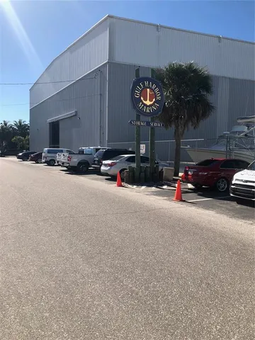 a view of a street with cars