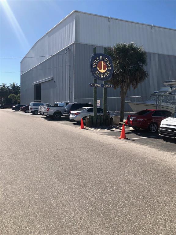 100 Circuit Road, Unit N77 Nokomis, FL 34275 - Photo 9 of 12 a view of a street with cars